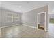 Spacious living room boasting neutral walls, tile floors, and natural light creating a bright and airy atmosphere throughout at 815 Rosemary Cir, Bradenton, FL 34212