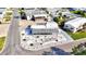 Aerial view of home showcasing the roof, covered parking, and surrounding landscaping at 818 50Th Avenue W Ter, Bradenton, FL 34207