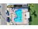 Aerial view of a refreshing pool surrounded by lounge chairs, perfect for relaxation and enjoying sunny days at 818 50Th Avenue W Ter, Bradenton, FL 34207