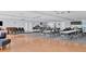 Large common room with tables, chairs, and ample space for gatherings at 102 46Th Avenue W Ter # 402, Bradenton, FL 34207