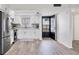 A bright and updated kitchen with stainless steel appliances and white cabinets at 102 46Th Avenue W Ter # 402, Bradenton, FL 34207