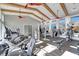 Community gym with modern fitness equipment, high ceilings, and natural light at 12026 Perennial Pl, Bradenton, FL 34211