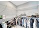Organized walk-in closet featuring shelving, hanging rods, and ample storage space for clothes and accessories at 12026 Perennial Pl, Bradenton, FL 34211