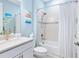 Bright bathroom with a combined shower and bathtub at 12404 Golden Sage Dr, Sarasota, FL 34238