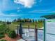 Community dog park with secure fencing, agility equipment, and grassy area for large dogs at 12404 Golden Sage Dr, Sarasota, FL 34238
