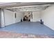 Spacious two-car garage with epoxy flooring and ample room for storage or a workshop at 12404 Golden Sage Dr, Sarasota, FL 34238