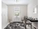 Home office features neutral paint, neutral cabinets, and a black accent rug at 12404 Golden Sage Dr, Sarasota, FL 34238