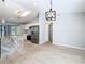 Open-concept kitchen features a large island with stone countertops and stainless steel appliances at 13365 Drayton Dr, Spring Hill, FL 34609