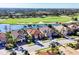 Lovely aerial view of beautiful homes lining the golf course and waterway at 15606 Leven Links Pl, Lakewood Ranch, FL 34202