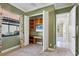 Bedroom features a built-in desk and shelves; perfect for an office or study at 15606 Leven Links Pl, Lakewood Ranch, FL 34202