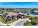 Beautiful clubhouse with a lake view and luxurious landscaping at 15606 Leven Links Pl, Lakewood Ranch, FL 34202