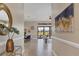 Beautiful foyer showcasing an open floorplan leading to the dining and living area at 15606 Leven Links Pl, Lakewood Ranch, FL 34202