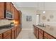 Kitchen with stainless steel appliances, granite countertops, and ample cabinet space at 15606 Leven Links Pl, Lakewood Ranch, FL 34202