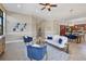Bright and inviting living room showcasing modern furnishings and an open floor plan at 15606 Leven Links Pl, Lakewood Ranch, FL 34202