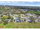 Aerial view of a suburban neighborhood featuring mature trees and well-maintained homes at 1622 17Th E St, Bradenton, FL 34208