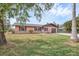Charming single-Gathering home with a brick facade and well-manicured lawn at 1622 17Th E St, Bradenton, FL 34208