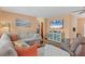 Bright living room with a comfortable sectional sofa and a mounted television at 1622 17Th E St, Bradenton, FL 34208