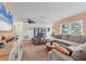 Cozy living room with comfortable seating, a ceiling fan, and stylish decor at 1622 17Th E St, Bradenton, FL 34208