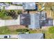 Aerial view of home with long driveway and neighboring houses at 2121 Florinda St, Sarasota, FL 34231