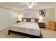 Comfortable bedroom with neutral tones, modern decor, large window, and closet for optimal storage at 3053 Concord St, Sarasota, FL 34231
