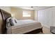 Comfortable bedroom featuring a ceiling fan, window, and closet at 3053 Concord St, Sarasota, FL 34231
