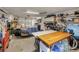 Organized garage space with workbench, shelving, and ample storage at 3053 Concord St, Sarasota, FL 34231