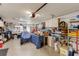 View of the garage with ample storage, shelving, and work area at 3053 Concord St, Sarasota, FL 34231