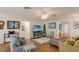 Bright living room with hardwood floors, neutral paint, and an open layout at 3053 Concord St, Sarasota, FL 34231