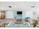 Relaxing clubhouse seating area with a TV and comfortable furniture at 3296 Tallywood Ct # 7097, Sarasota, FL 34237