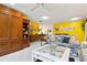 Spacious living room with tile flooring, large windows and view of the kitchen at 3296 Tallywood Ct # 7097, Sarasota, FL 34237