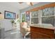 This is a bright office space with natural light and a comfortable chair and desk at 3296 Tallywood Ct # 7097, Sarasota, FL 34237