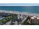 Beautiful beach side aerial view of community amenities including a large pool and beach access at 3617 Fair Oaks Pl, Longboat Key, FL 34228