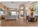 Spacious living room with high ceilings, hardwood floors, and waterfront views at 3617 Fair Oaks Pl, Longboat Key, FL 34228