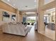Inviting living room showcasing sophisticated furnishings, neutral color palette, and abundant natural light at 3617 Fair Oaks Pl, Longboat Key, FL 34228