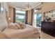 Serene main bedroom with sliding glass doors that provides access to a pool area at 3617 Fair Oaks Pl, Longboat Key, FL 34228