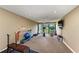 This home gym includes weights, stationary bike, and a ballet bar at 3805 E Bay Dr # 301, Holmes Beach, FL 34217