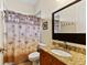 Comfortable bathroom with a patterned shower curtain at 3902 162Nd E Ave, Parrish, FL 34219