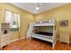 Bedroom featuring a bunk bed, and ample storage space at 3902 162Nd E Ave, Parrish, FL 34219