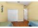 Comfortable bedroom with a closet, and light walls at 3902 162Nd E Ave, Parrish, FL 34219
