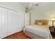 Comfortable bedroom with a ceiling fan, closet and light walls at 3902 162Nd E Ave, Parrish, FL 34219
