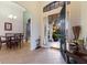 Bright dining room adjacent to the foyer and featuring views of the front yard at 3902 162Nd E Ave, Parrish, FL 34219