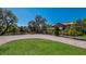 Lush greenery surrounds a charming home with a private dock on the serene riverfront at 3902 162Nd E Ave, Parrish, FL 34219