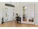 Inviting foyer with tile flooring, transom window, and double front doors at 3902 162Nd E Ave, Parrish, FL 34219