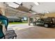 Spacious garage with epoxy floors and room for multiple cars at 3902 162Nd E Ave, Parrish, FL 34219