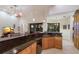 Spacious kitchen with a bar counter and open layout, ideal for entertaining and casual dining at 3902 162Nd E Ave, Parrish, FL 34219