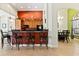 Stylish kitchen featuring a breakfast bar with black counter tops at 3902 162Nd E Ave, Parrish, FL 34219