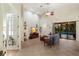 Bright living room with high ceilings, neutral walls, and large sliding doors to the pool at 3902 162Nd E Ave, Parrish, FL 34219