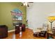 Home office with hardwood floors, and a large window providing natural light at 3902 162Nd E Ave, Parrish, FL 34219