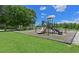 Explore the community playground with slides and climbing structures, set in a grassy, open area at 3902 162Nd E Ave, Parrish, FL 34219