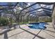 Large screened in pool area perfect for entertaining and dining al fresco, or simply enjoying a lazy day at home at 3902 162Nd E Ave, Parrish, FL 34219